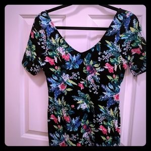 A v-neck bodycon dress